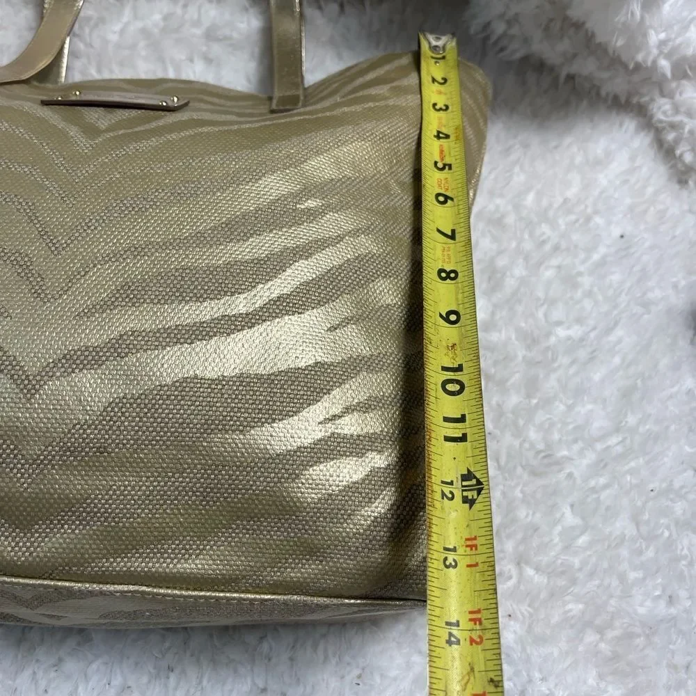Michael Kors Metallic gold zebra print large tote gold tone hardwares and straps
